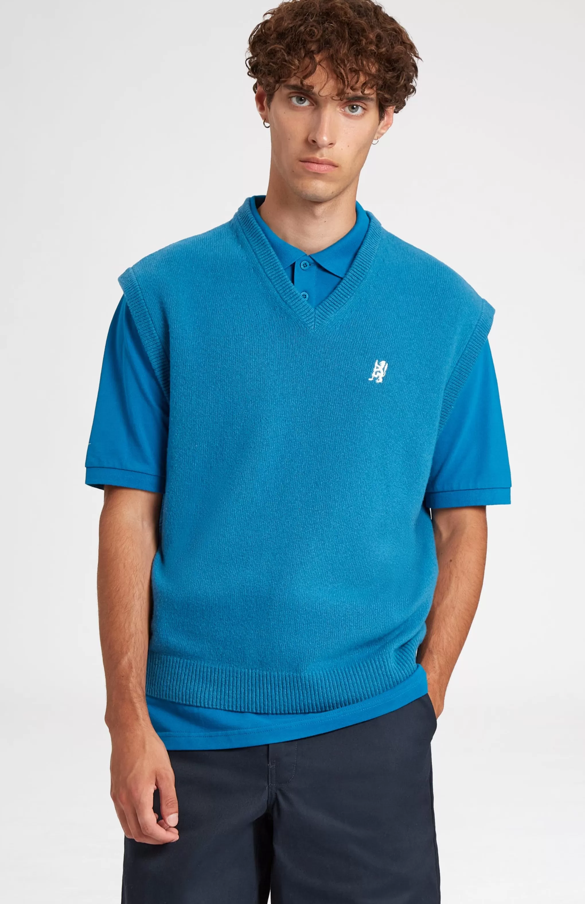 Fashion V Neck Sleeveless Golf Jumper In Lagoon With Golfing Lion Logo Men V Neck Knits